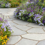 Summer Flowerbeds and garden slates in Botanical garden of Gothenburg, Sweden.